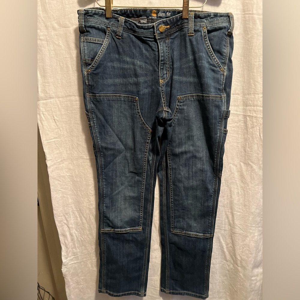 Carhartt slim fit , double knee jeans. Size 12. Blue. Great shape.